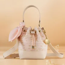 Estee Lauder: A Free Exclusive Bucket Bag with Any $130 Glimmer Purchase